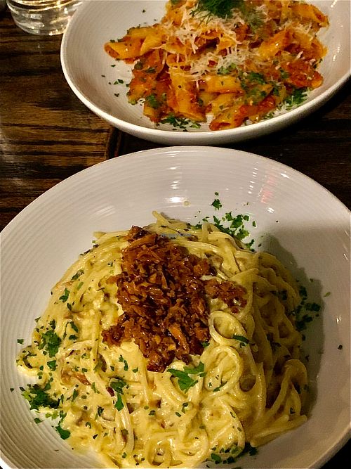 Carbonara & daily special: tomato sausage penne.  at Pura Vita in West Hollywood