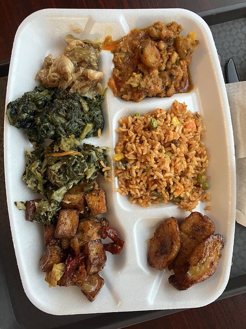 Cabbage, red red stew, jollof rice, fried plantains, chef’s special tofu, mixed greens, spinach (all vegan from buffet)  at Africanne on Main in Richmond