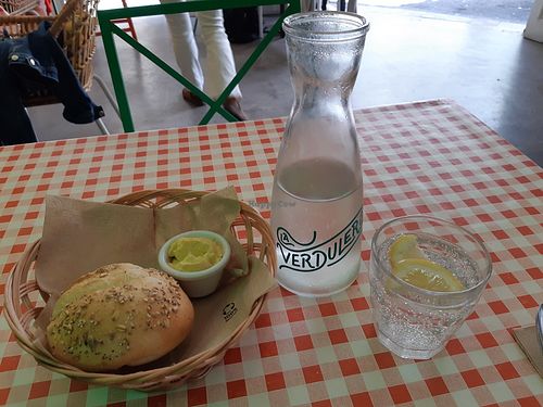 Bread, spicy vegan mayo and fizzy water at La Verduleria in Tenerife
