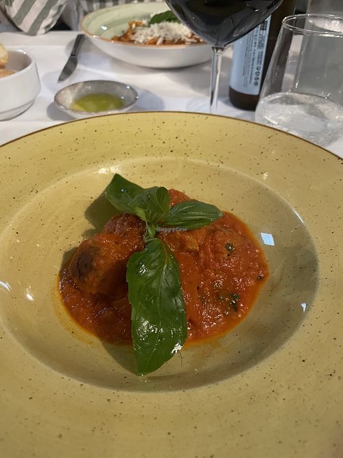 Sicilian balls (chickpea and aubergine) in tomato sauce.  at Rosmarino in Taormina
