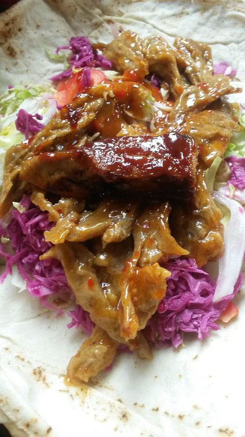 Fabulous buffalo wings in flat bread with salad at Sun of Seitan in Newcastle Upon Tyne