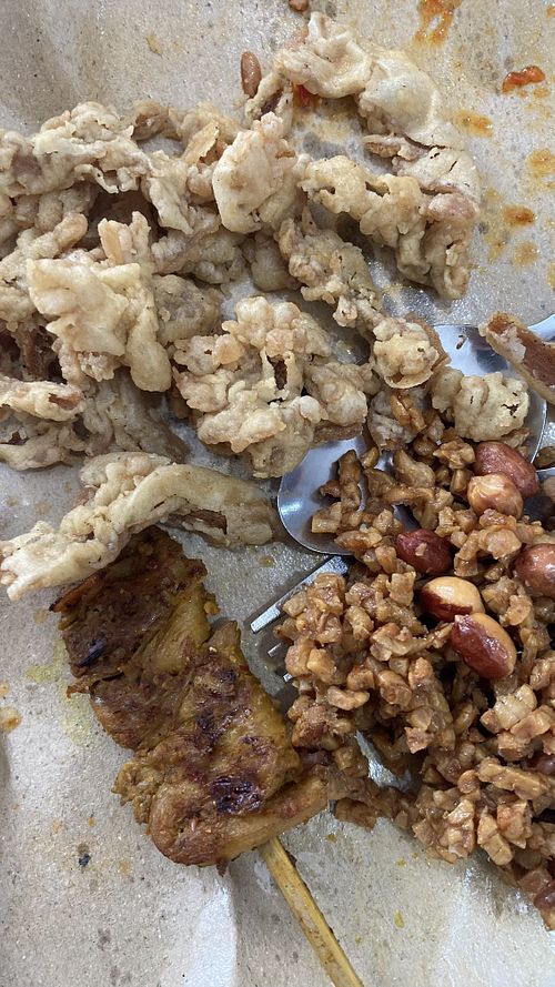 Fried mushrooms and sweet tempeh with peanuts  at Vegan House in Jakarta