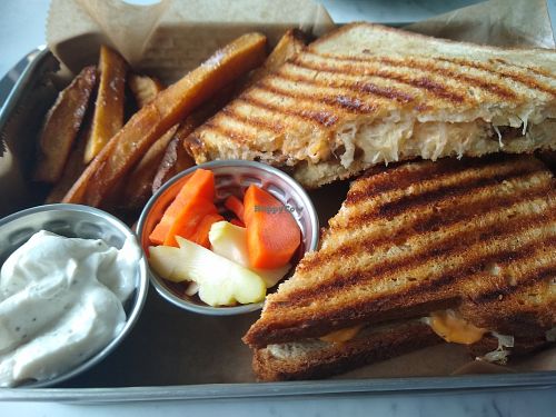 Reuben sandwich, frites, and garlic aioli at L'Eau de Vie in Baltimore