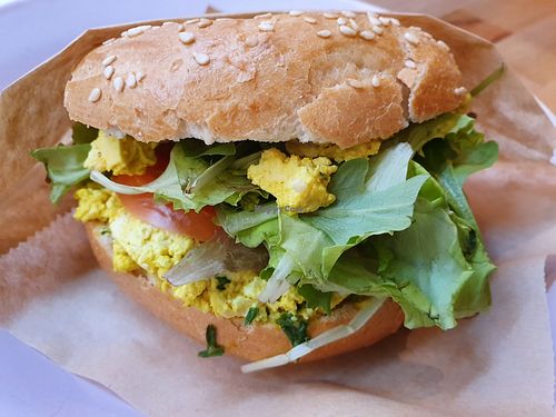 Came back for the second time and got the scrambled tofu bagel, also delicious (but the pizza bagel is even better!!! 💚💚💚)! at Brammibal's Donuts - Potsdamer Platz in Berlin