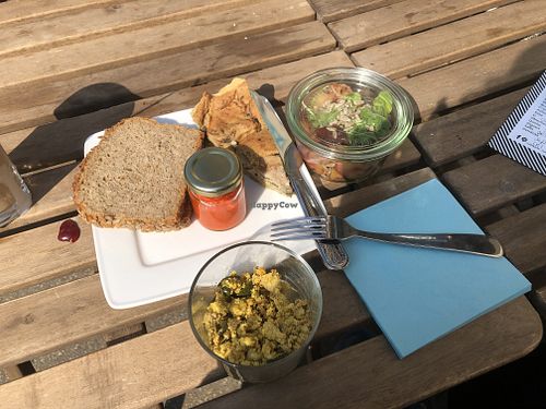 Tofu scramble, quiche, potato salad with apple and beets and bell pepper cream  at Kune in Leipzig