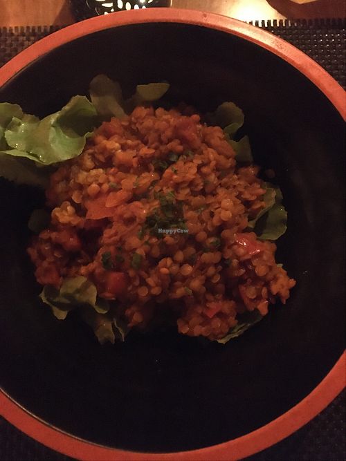 Coral lentil stew seasoned with curry powder at A Casa di l'orsu in Corsica