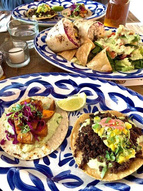 Sweet potato taco, vegan chorizo tostada & burrito. at Yuca in Rovaniemi