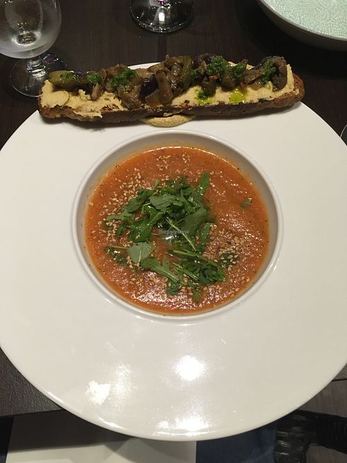 Gazpacho (cold soup) and a crostini with hummus and cooked vegetables at La Tomate Noire in Corsica