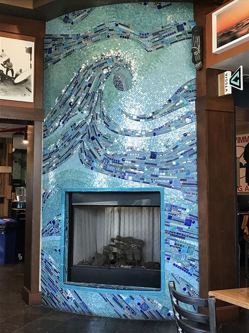 Mosaic fireplace. Awesome decor in surfinista cafe! at Cafe Surfinista in Indialantic