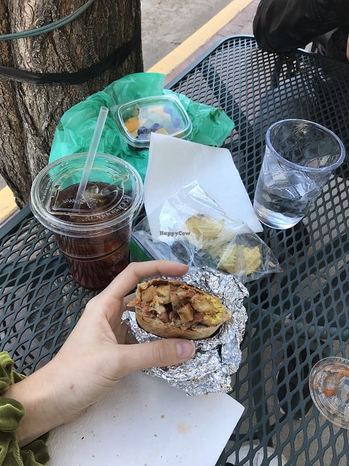 Delicious burrito served w/ salsa & fresh fruit at Sita's Kitchen  in Trinidad