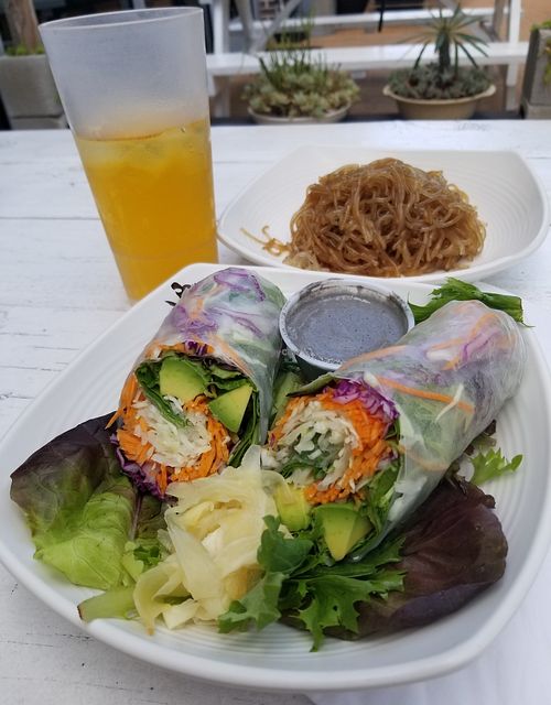 Avocado Prism Roll with tahini dressing and pickled ginger on the side. Jasmine green tea. Sweet potato noodles. at Nancy's Sky Garden in Austin