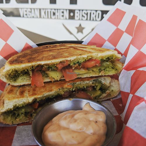 Pesto caprese panini  at The Outpost Vegan Kitchen and Food Store in Groveland