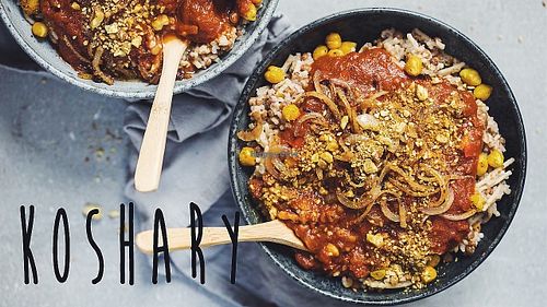 Layers of Egyptian rice, Macaroni, Spaghetti, Chickpeas and Black lentils topped with Tomato sauce and fried onions , served  with Garlic & Chili sauce at The Pharaoh's Restaurant in Vientiane