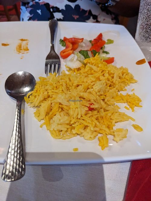 Yellow rice. Food was so appetizing, we almost forgot to photograph it! at Lucy Ethiopian Restaurant and Lounge in Houston
