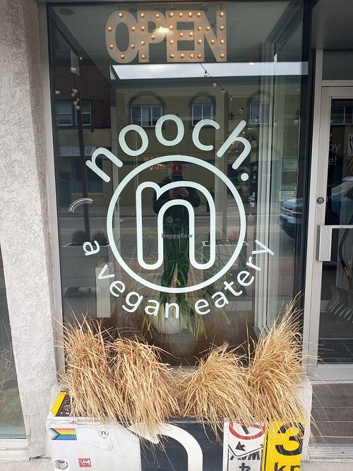 Front window logo. at Nooch in Windsor