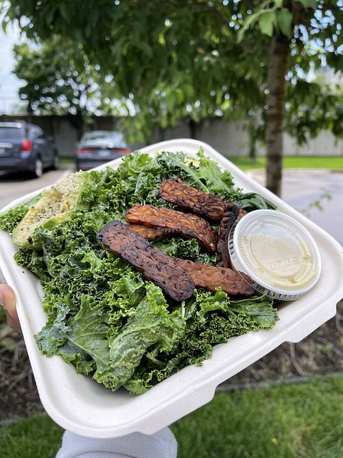 Kale Salad with tempeh bacon and avocado $16 (my fav item here)  at Seed Cafe in Minneapolis
