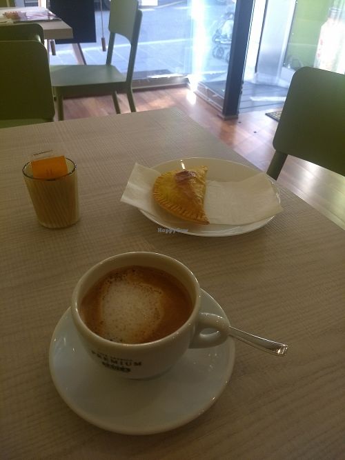 Empanada and coffee with plantbased milk at Mandala in Tarragona