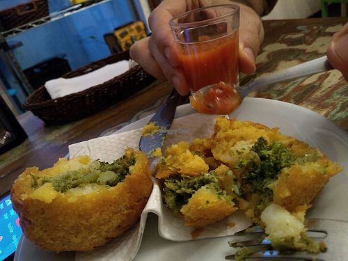 Open coxinha and pepper sauce at Cafe com Proposito in Londrina