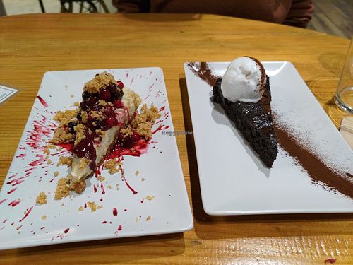 Cheesecake and chocolate cake with coconut ice cream at Roots & Rolls in Barcelona