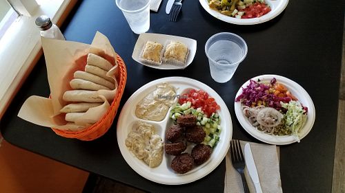 Falafel platter, with veggie sides, baba ganoush, hummus, salad bar stuff, and a ton of pita bread. Lotsa food!!! at ChickPeas Kitchen in Woodland