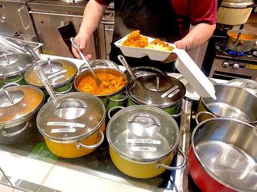 Staff serves up your selections to go at Wazwan Indian Cuisine in Emeryville