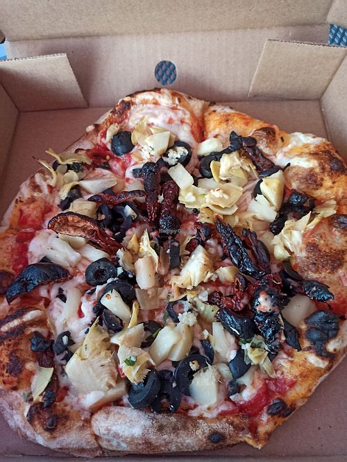 Look how that cheese melts! I asked for sun-dried tomatoes, artichokes, black olives and pineapple at Oven 360 in Windsor