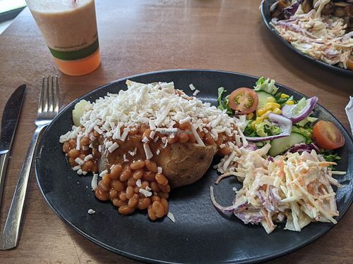 Cheese and beans baked potato at Seascape Cafe in Chapel St Leonards