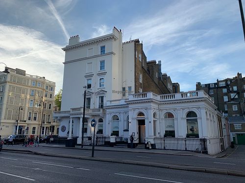 More exterior - the whole thing, rather charming if blocky and by a big naff road at Pizza Express - Cromwell Rd in South West London
