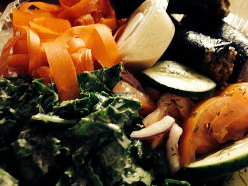 Raw entree- carrot slaw, creamy kale and walnut nori rolls plus a tomato cucumber dill salad at Senbeb Cafe in Washington