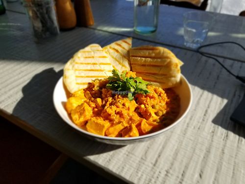 Tofu au beurre et pain naan. Exquis. at Veganation in Montreal