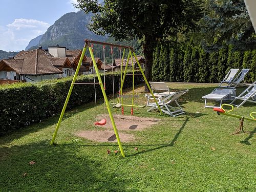 Children playground next to the restaurant  at Hotel Europa in Molveno