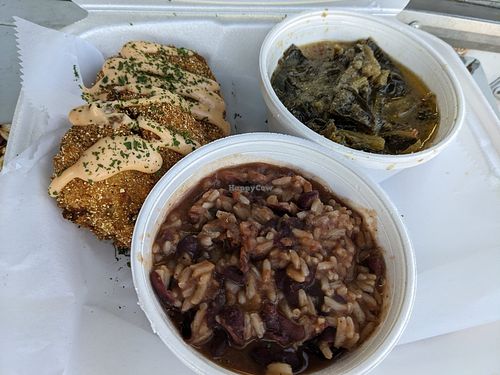 Crab cakes, mixed greens, red beans & rice at Lindiana's Southern Vegan Kitchen - Maybe closed in Houston