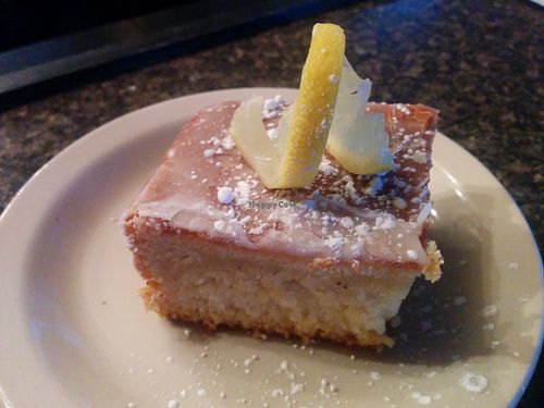 Lusciously moist lemon cake with sprinkling of powdered sugar - the day's dessert rotation. Made from scratch, of course. at Lindiana's Southern Vegan Kitchen - Maybe closed in Houston