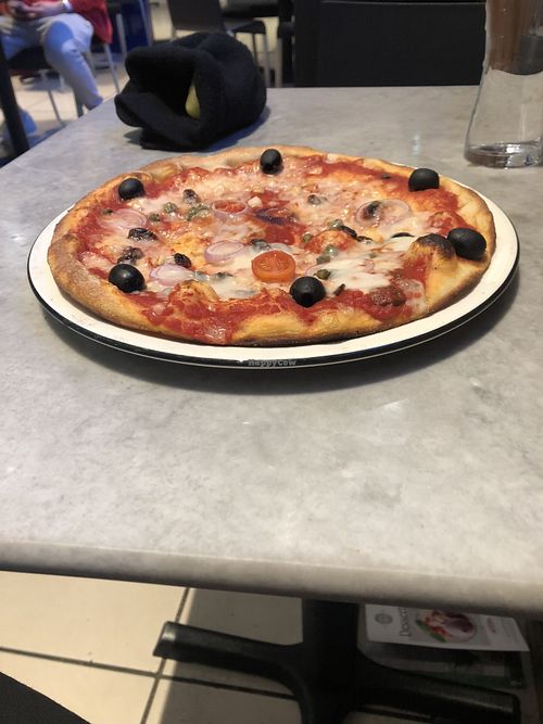 vegan pizza  at Pizza Express - Olympia in London