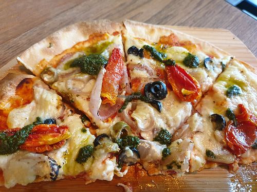 Mediterranean pizza has thin crispy base at The Vegan Table in Phuket