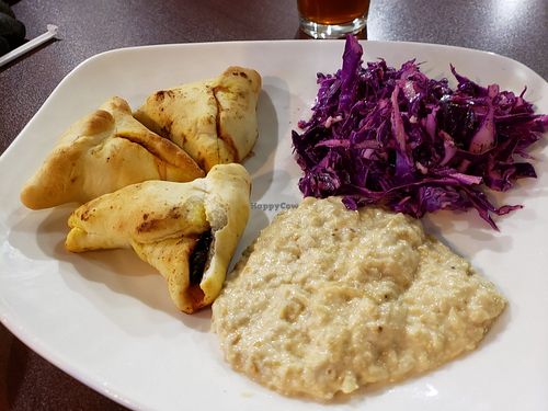 spinach pies plate with sides of baba ganoush and red cabbage salad at Odeh's Mediterranean Restaurant in Elko