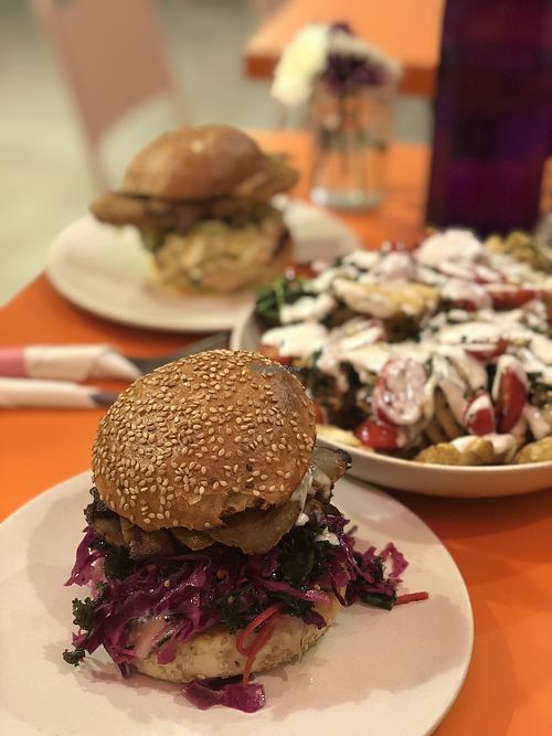 Burgers with waffle fries  at Hartbreakers in Brooklyn