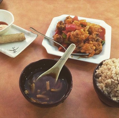 lunch special sweet and sour mushroom chicken, spicy soup, brown rice, egg roll at Happy Family - San Bernardino in San Bernardino