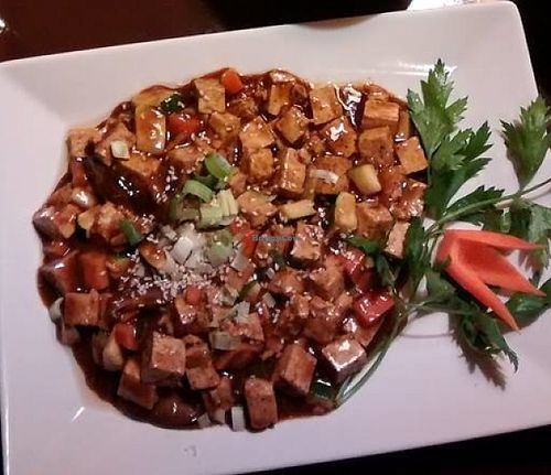 "Meatballs" on top, served with fresh vegetables.
Tofu with a mushrooms sauce on the bottom at Kokyo in Stockholm