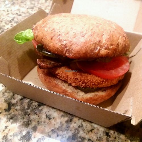 chicken burger with tempeh bacon at Next Level Burger - Austin in Austin