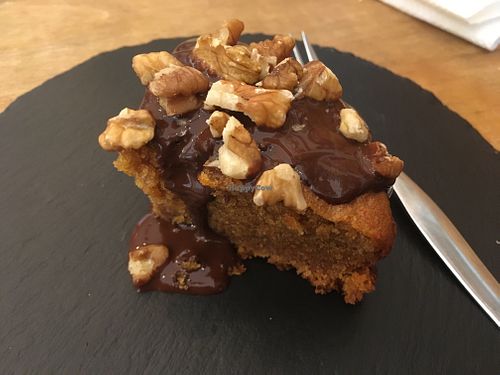 Carrot cake with chocolate sauce and walnuts at Las Vegan in Lisbon