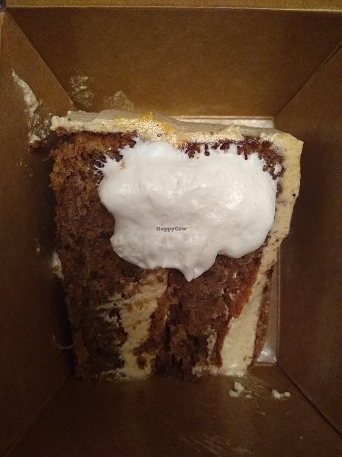 Gluten free hummingbird cake with whipped cream at Arles and Boggs  in Wallingford