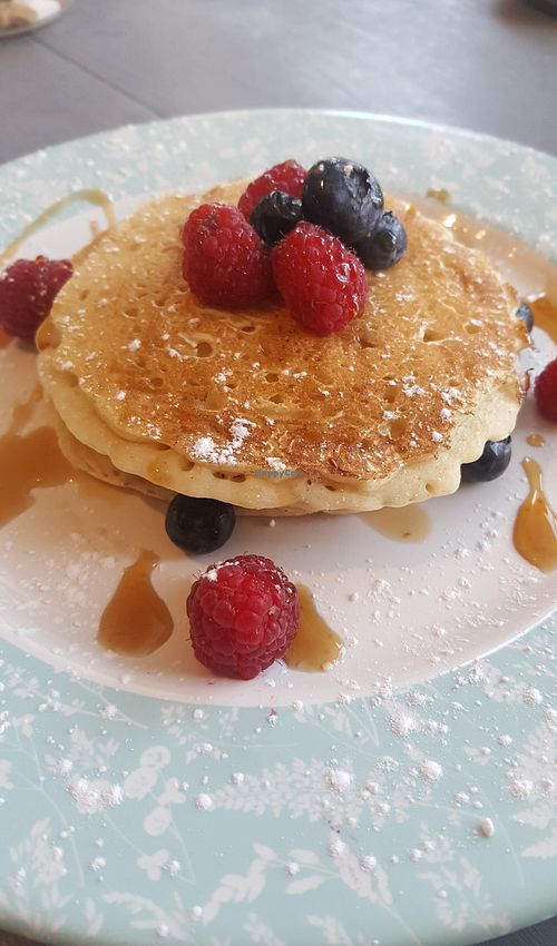 Delicious pancakes with maple syrup and seasonal fruit at The Greenhouse in Horsforth