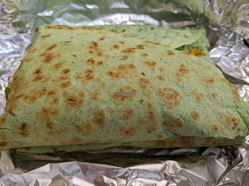 Vegan quesadilla in spinach wrap at Ole Ole Burrito Express in Oakland