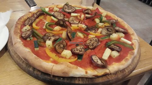 Pizza without cheese at Pomodoro in Vientiane