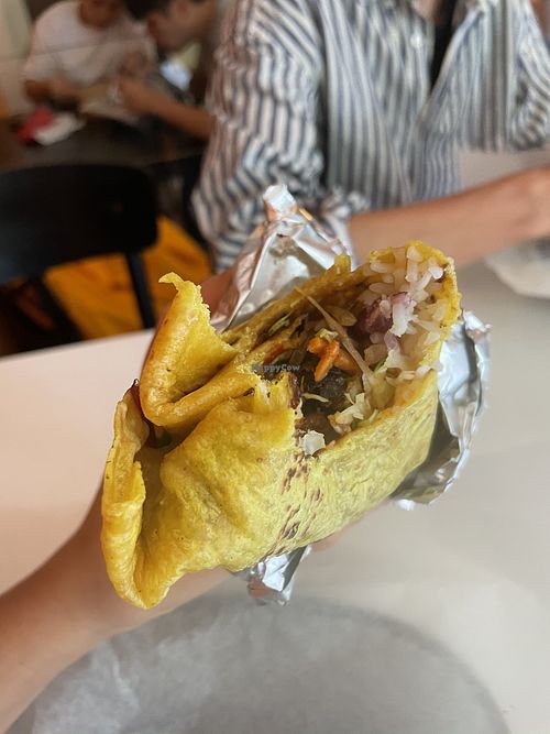 First bite to a yummy vegan burrito :P at Burrito Friends in Malmo