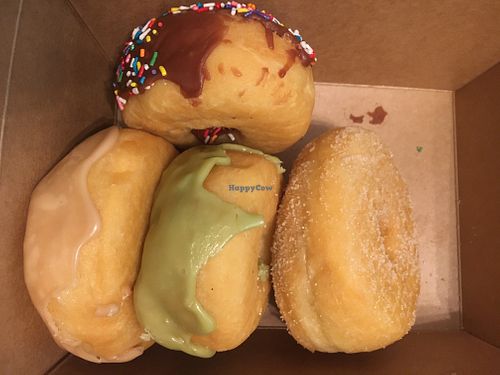 What's left of the half dozen donuts we just picked up. at Vegan Bistro in San Jose