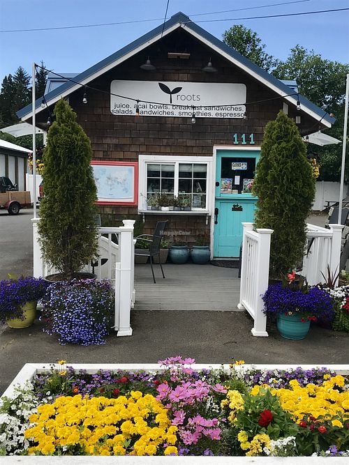 primarily a drive thru but there are two little tables out front  at Roots Juice Java and Salad Bar in Ilwaco