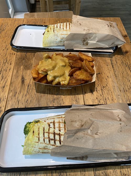 Two wraps with potatoe wedges with peanut hummus   at Gustav Grün - Wilhelmstraße in Muenster