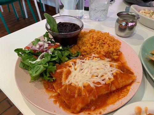 Warm, melty enchiladas! They let me have one of each chicken, beef, and cheese. at Belenty's Love in Granbury